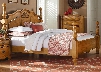 Georgetown Collection 8301123 King Size Poster Bed with Decorative Carved Shell Ornament Curvy Crown Molding and Turned Posts in Honey Pine