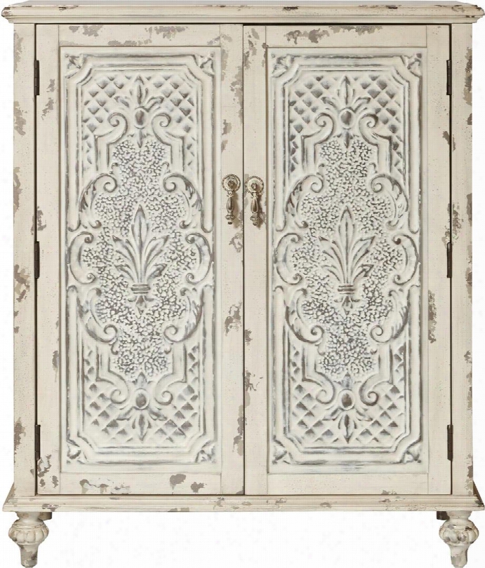 P017017 37" Distressed Fleur De Leis Accent Two Door Chest With One Adjustable Shelf Molding Detail And Turned Legs In