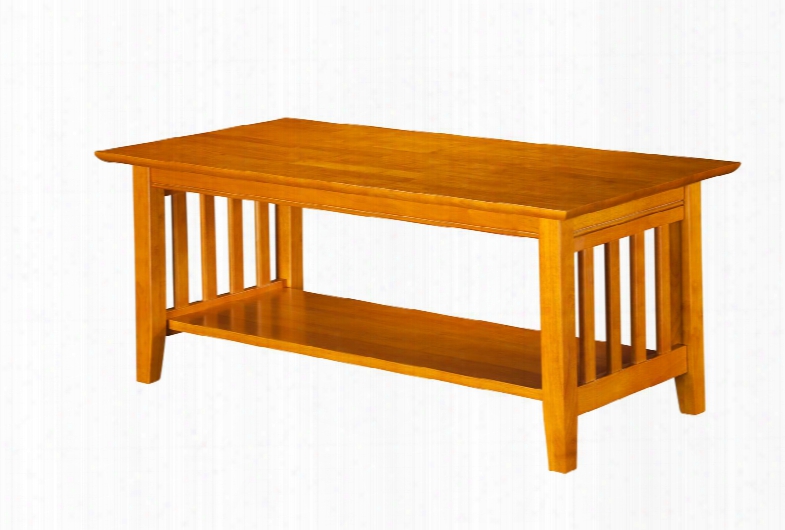 Ah15207 Mission Coffee Table With Apron Molding Detail Tapered Legs And Bottom Shelf In Caramel