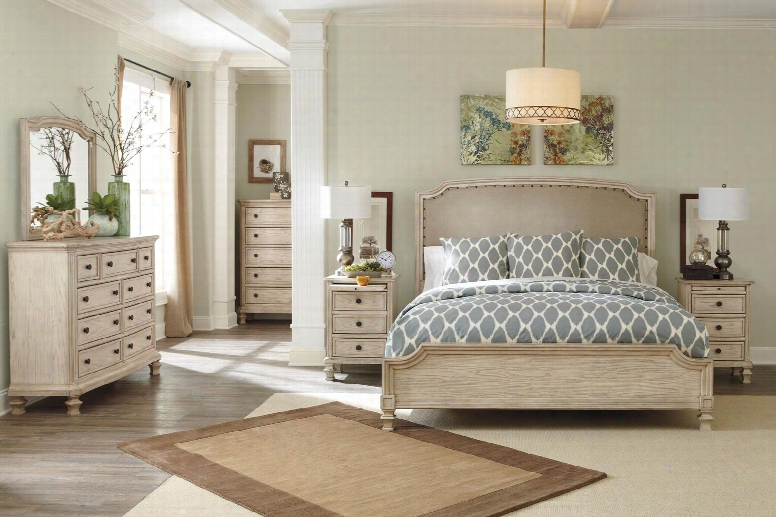 Demarlos King Bedroom Set With Upholstered Panel Bed Dresser Mirror And Chest In Parchment