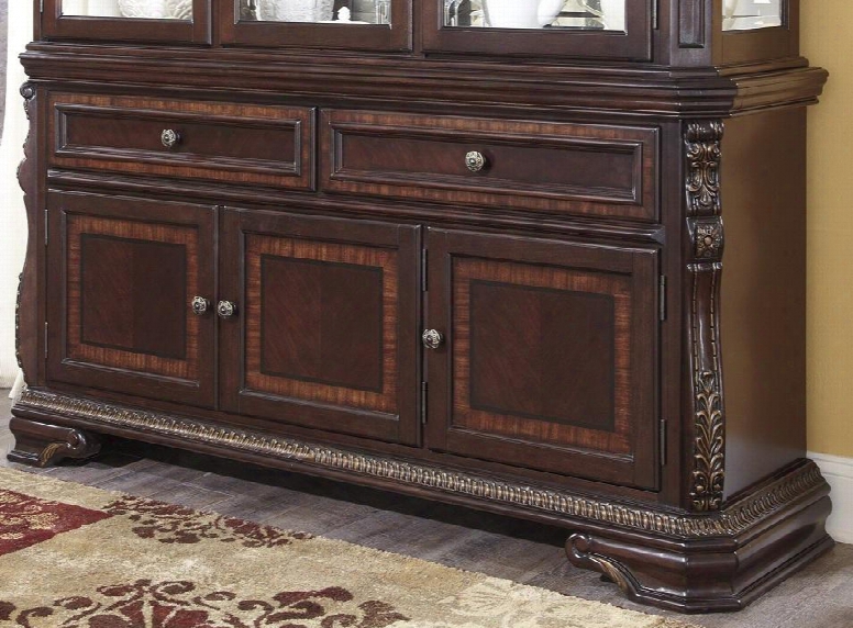 D67880 Wendlowe Dining Room Buffet With Two Larger Drawers Three Doors Rubberwood Solids Thick Profiled Tops Mouldings And Decorative Elements In Dark