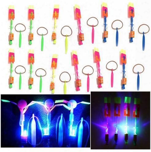 Hot 10pcs/lot Amazing Led Light Arrow Rocket Helicopter Rotating Flying Toys Party Fun Kids Outdoor Flashing Toy Fly Arrow