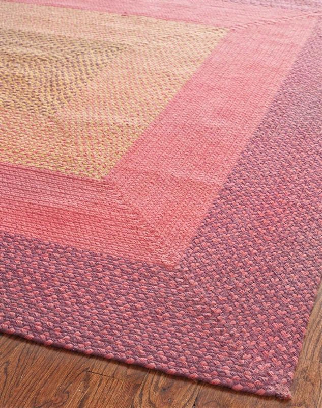 Braided Cllection Area Rug In Pinks And Orange Design By Safavieh